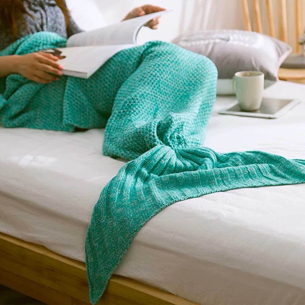 Turquoise crocheted mermaid tail blanket